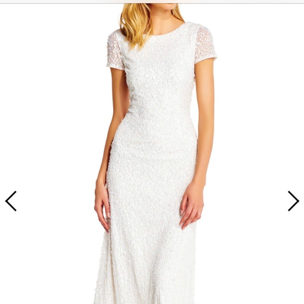 Floor length white sequined gown